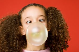 Orthodontist Dr. Zohreh Rasouli at Oyster Bay Orthodontics explains the health risks associated with chewing and swallowing gum